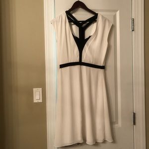 White BCBGMaxAzria knee dress,black Y strap detail